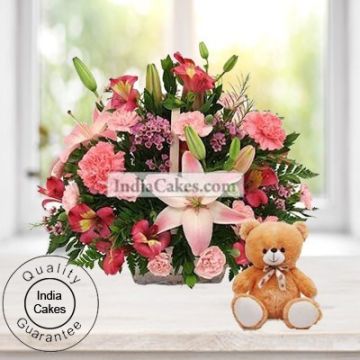 4 Lilies and 15 Carnations Arranged in Basket With a Cute Teddy
