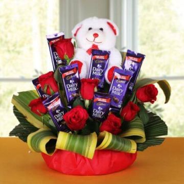 6 Red Rose and 6 Dairy Milk Chocolates with a Teddy