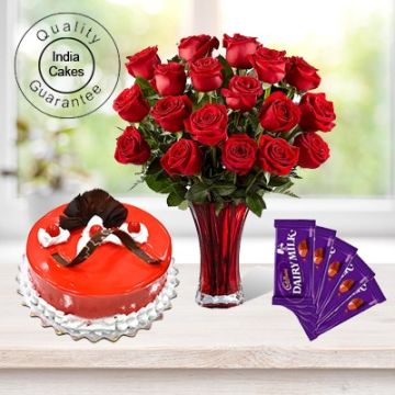 Eggless Strawberry Cake Half Kg with 6 Red Roses Bunch and 5 Chocolates