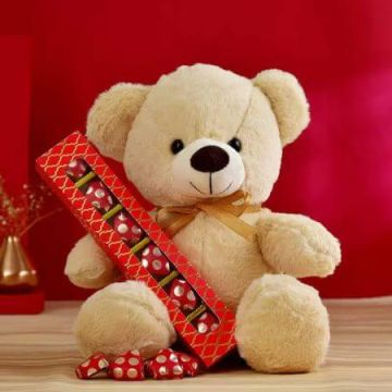 Heart Shaped Chocolates and a Teddy Bear