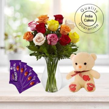 6 MIX FLOWERS BUNCH,1 TEDDY BEAR AND 5 ASSORTED CADBURY CHOCOLATES