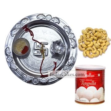 Silver Thali And Rasgulla And Cashew