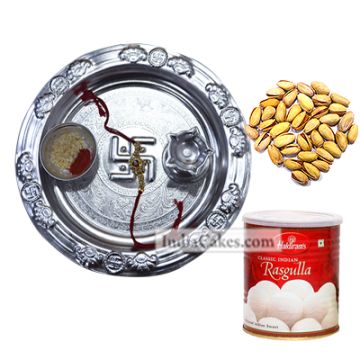 Silver Thali And Rasgulla And Pista