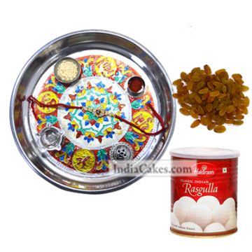 Silver Thali With Design And Rasgulla And Raisins