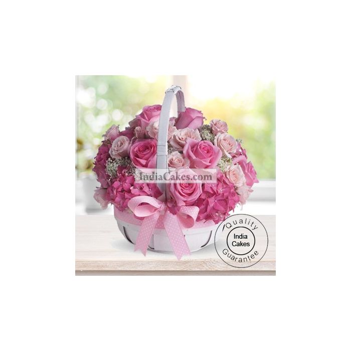 50 PINK ROSES ARRANGED IN A BASKET 50 PINK ROSES ARRANGED IN A BASKET