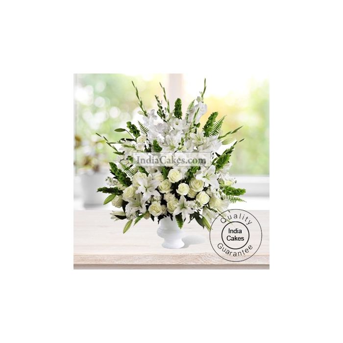 ARRANGEMENT OF LILIES, ANTHURIUMS, ORCHIDS, ROSES AND CARNATIONS ( ALL WHITE FLOWERS ) ARRANGEMENT OF LILIES, ANTHURIUMS, ORCHIDS, ROSES AND CARNATIONS ( ALL WHITE FLOWERS )