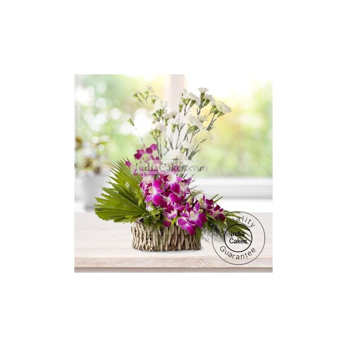 ARRANGEMENT OF ORCHIDS AND CARNATIONS ARRANGEMENT OF ORCHIDS AND CARNATIONS