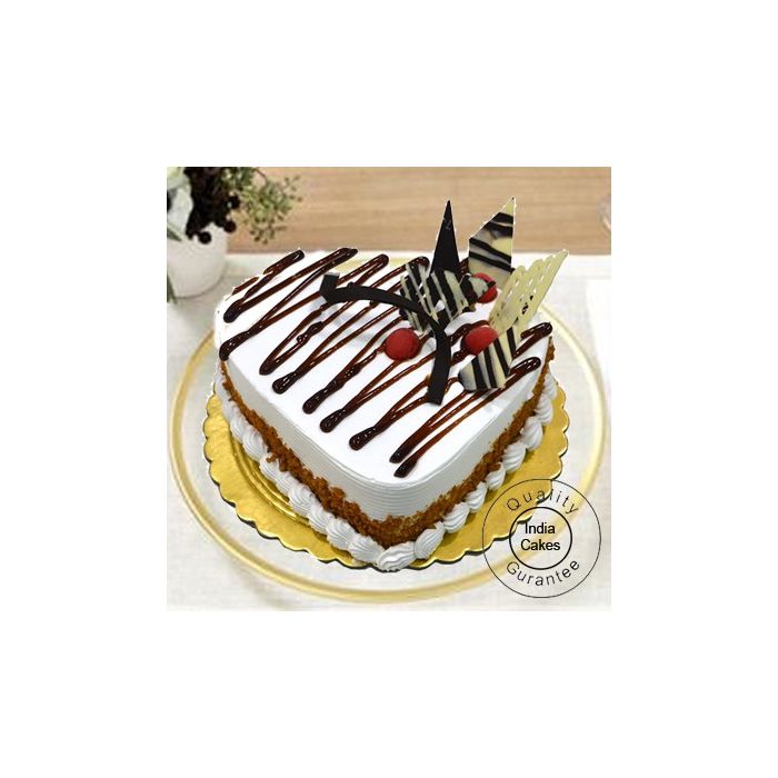 Eggless Butterscotch Cake 1 Kg Heart Shaped Eggless Butterscotch Cake 1 Kg Heart Shaped