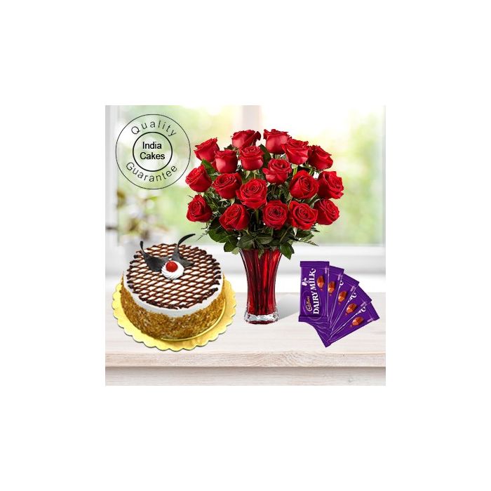 Eggless Butterscrotch Cake 1 Kg with 6 Red Roses Bunch and 5 Chocolates Eggless Butterscrotch Cake 1 Kg with 6 Red Roses Bunch and 5 Chocolates
