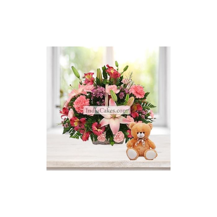 4 Lilies and 15 Carnations Arranged in Basket With a Cute Teddy 4 Lilies and 15 Carnations Arranged in Basket With a Cute Teddy
