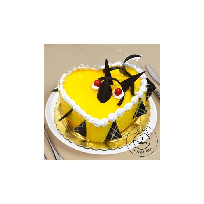 1 Kg Eggless Mango Cake Heart Shape 1 Kg Eggless Mango Cake Heart Shape