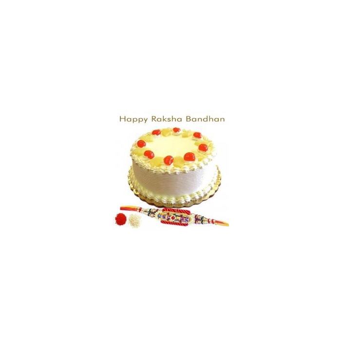 1 Kg Pineapple Cake With Rakhi 1 Kg Pineapple Cake With Rakhi