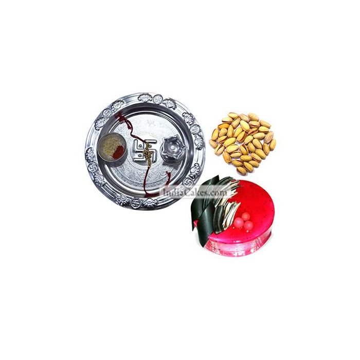 Silver Thali And Half Kg Eggless Strawberry Cake And 250 gms Pista Dryfruits - Courieredp Silver Thali And Half Kg Eggless Strawberry Cake And 250 gms Pista Dryfruits - Courieredp