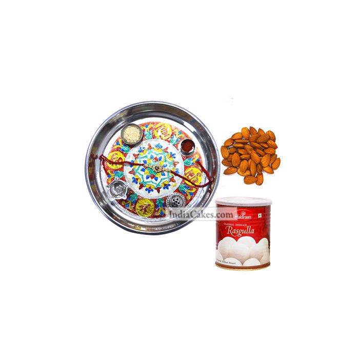Silver Thali With Design And Rasgulla And Almond Silver Thali With Design And Rasgulla And Almond