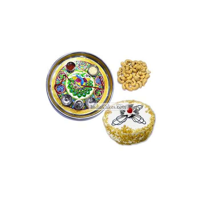 Golden Thali With Green Design And Half Kg Eggless Butterscotch Cake And 250 gms Cashew Dryfruits Golden Thali With Green Design And Half Kg Eggless Butterscotch Cake And 250 gms Cashew Dryfruits