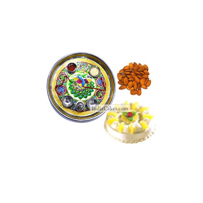 Golden Thali With Green Design And Half Kg Eggless Pineapple Cake And 250 gms Almond Dryfruits Golden Thali With Green Design And Half Kg Eggless Pineapple Cake And 250 gms Almond Dryfruits