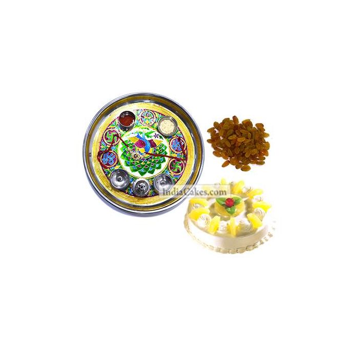 Golden Thali With Green Design And Half Kg Eggless Pineapple Cake And 250 gms Raisins Dryfruits Golden Thali With Green Design And Half Kg Eggless Pineapple Cake And 250 gms Raisins Dryfruits