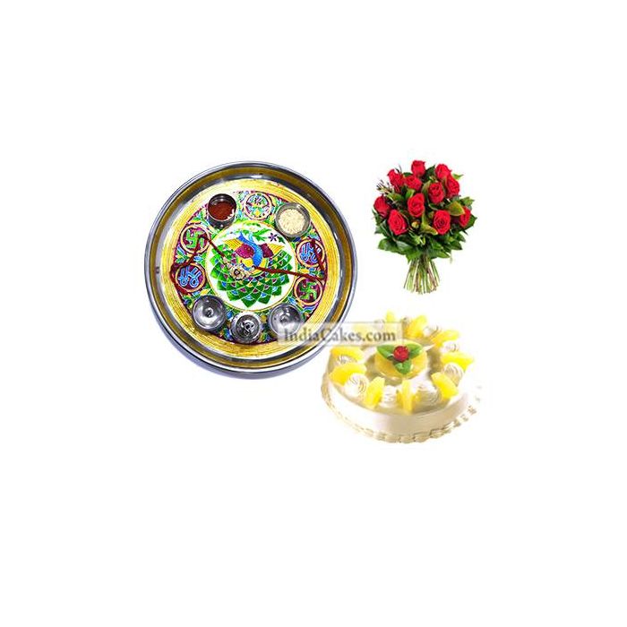 Golden Thali With Green Design And Half Kg Eggless Pineapple Cake And 10 Red Roses Bunch