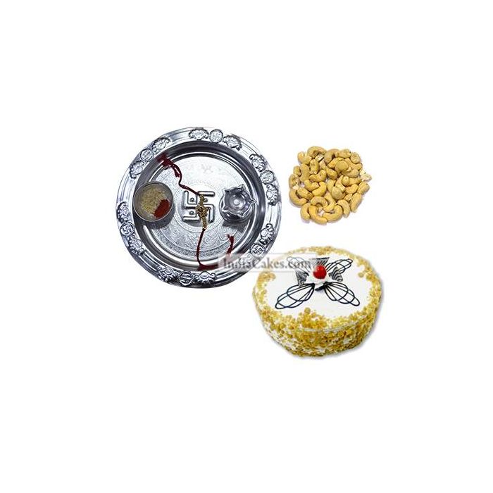 Silver Thali And Half Kg Eggless Butterscotch Cake And 250 gms Cashew Dryfruits Silver Thali And Half Kg Eggless Butterscotch Cake And 250 gms Cashew Dryfruits