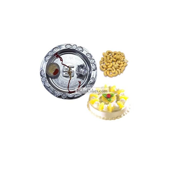 Silver Thali And Half Kg Eggless Pineapple Cake And 250 gms Cashew Dryfruits Silver Thali And Half Kg Eggless Pineapple Cake And 250 gms Cashew Dryfruits