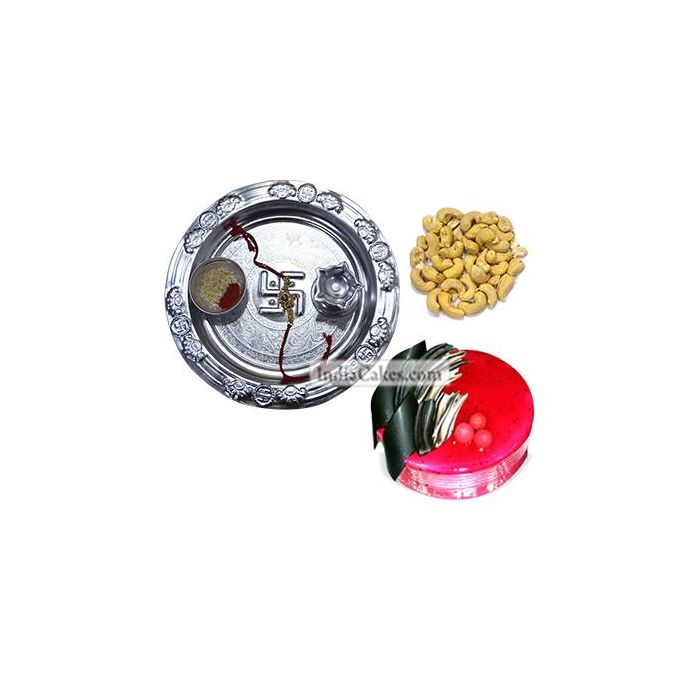 Silver Thali And Half Kg Eggless Strawberry Cake And 250 gms Cashew Dryfruits Silver Thali And Half Kg Eggless Strawberry Cake And 250 gms Cashew Dryfruits