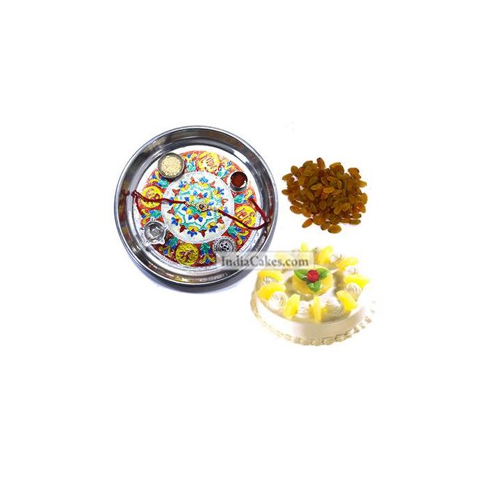 Silver Thali With Design And Half Kg Eggless Pineapple Cake And 250 gms Raisins Dryfruits Silver Thali With Design And Half Kg Eggless Pineapple Cake And 250 gms Raisins Dryfruits
