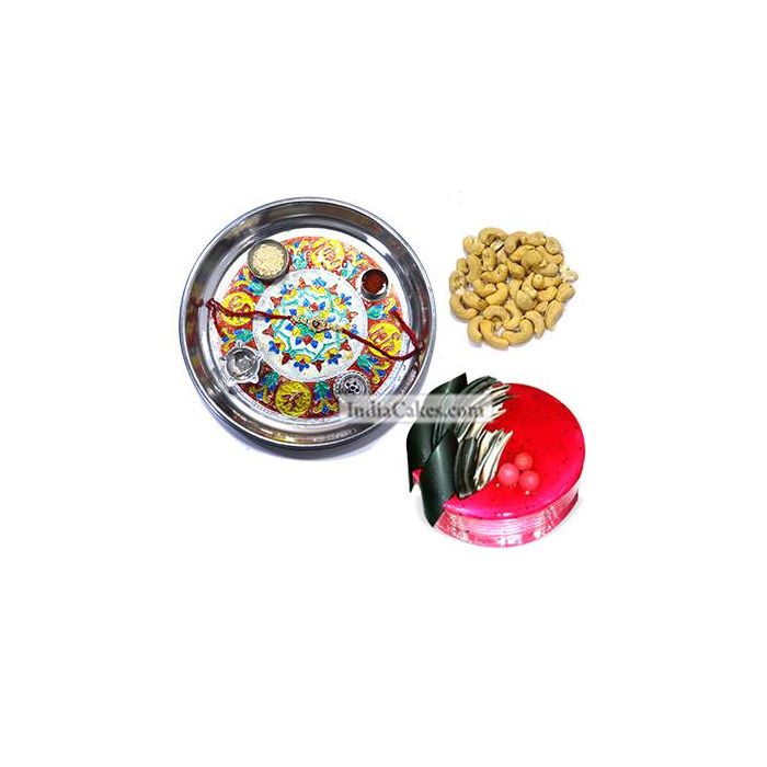 Silver Thali With Design And Half Kg Eggless Strawberry Cake And 250 gms Cashew Dryfruits Silver Thali With Design And Half Kg Eggless Strawberry Cake And 250 gms Cashew Dryfruits