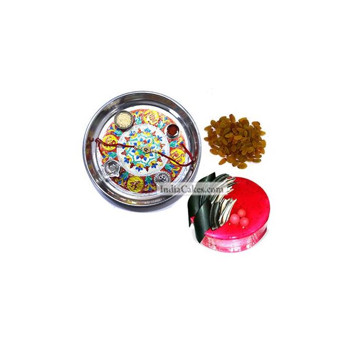 Silver Thali With Design And Half Kg Eggless Strawberry Cake And 250 gms Raisins Dryfruits Silver Thali With Design And Half Kg Eggless Strawberry Cake And 250 gms Raisins Dryfruits