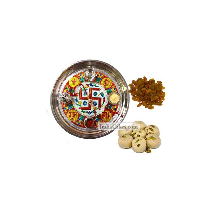 Golden Thali With Red Design And Pedha With Raisins Dryfruits Golden Thali With Red Design And Pedha With Raisins Dryfruits