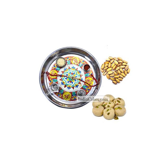 Silver Thali With Design And Pedha With Pista Dryfruits Silver Thali With Design And Pedha With Pista Dryfruits
