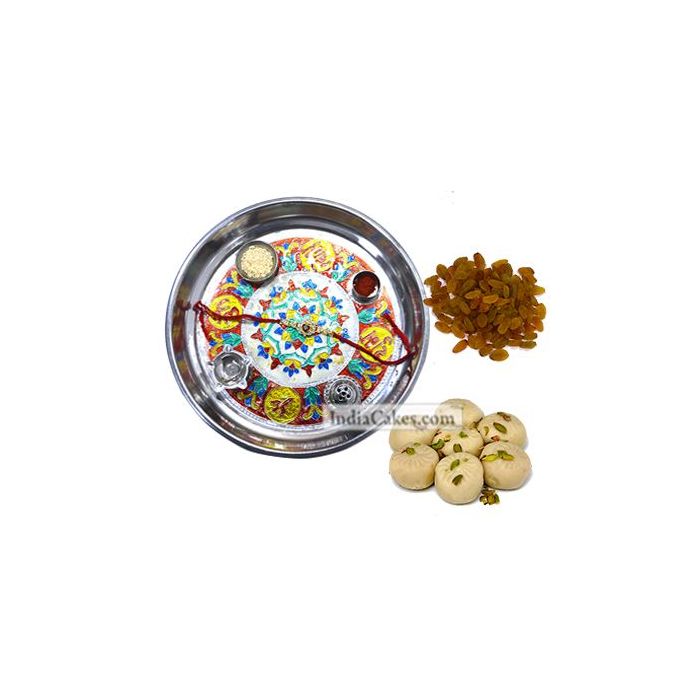 Silver Thali With Design And Pedha With Raisins Dryfruits Silver Thali With Design And Pedha With Raisins Dryfruits