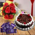Eggless Half Kg Black Forest Cake with 6 Red Roses Bunch and 5 Chocolates thumbnail