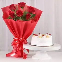 Pineapple Cake Half Kgs with 6 Red Roses Bunch